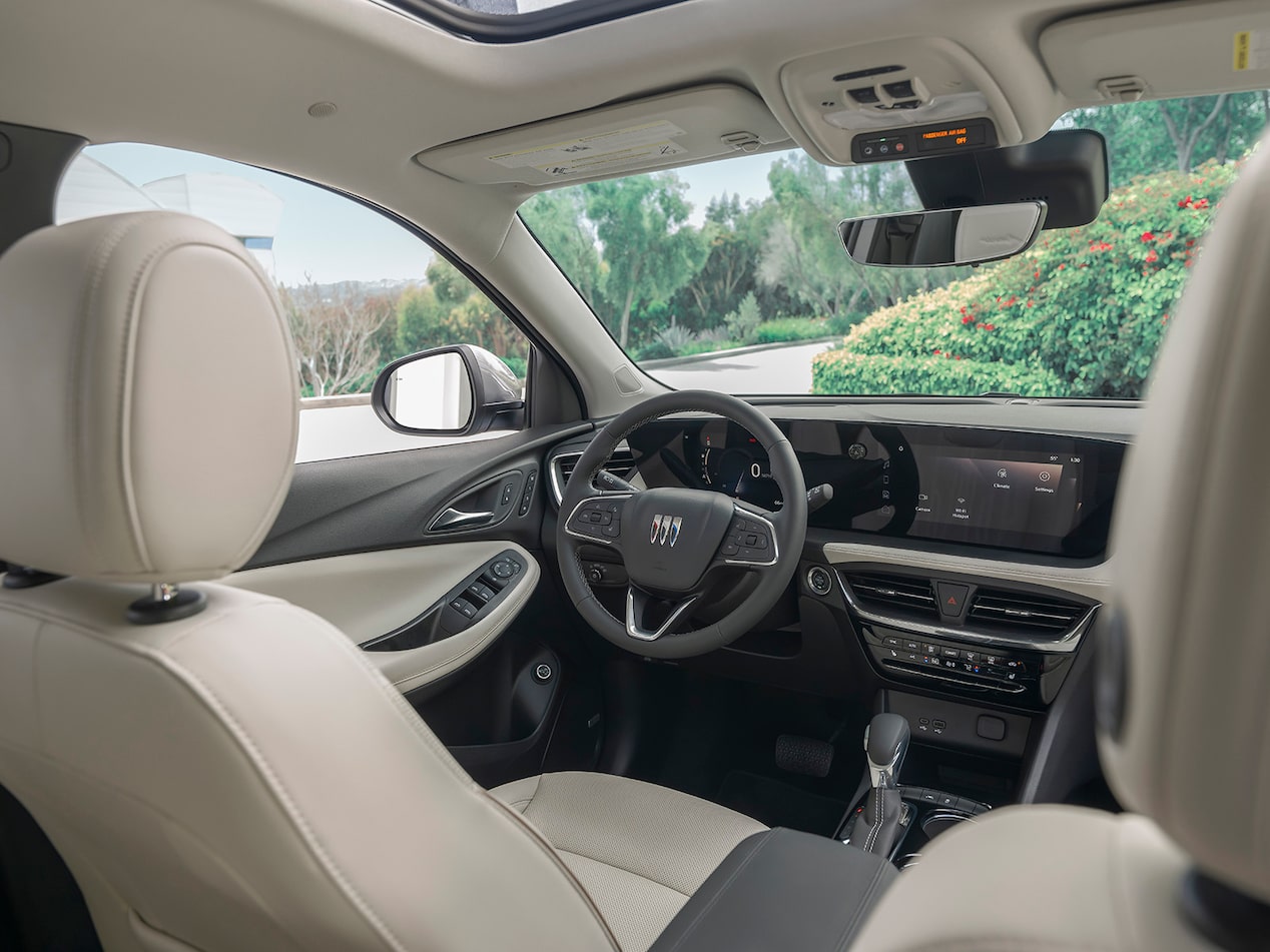 Back Seat View of the Steering Wheel and Infotainment Touch Screen of the Encore GX