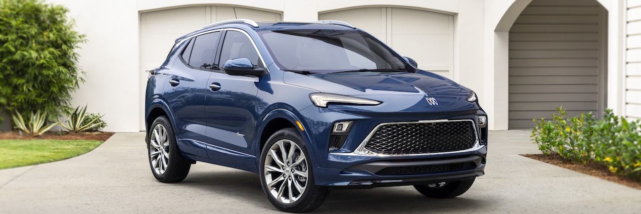 2024 Buick Encore GX Avenir Parked In Front Of Modern Building