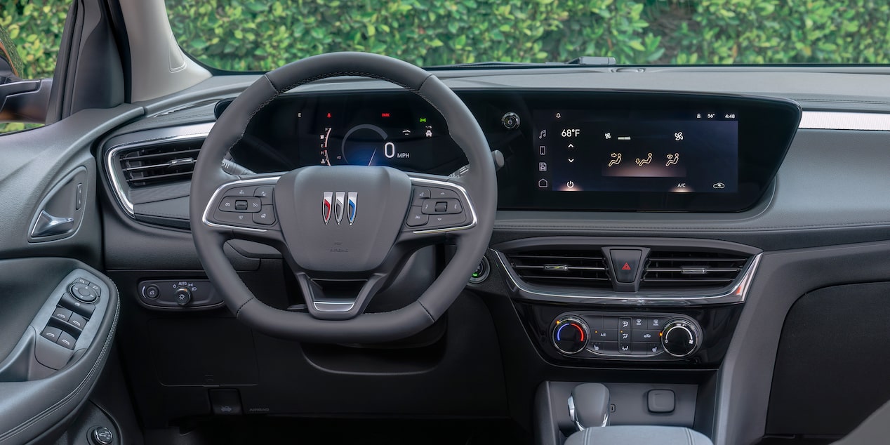 Driver's Side Interior Dashboard And Steering Wheel Inside The 2024 Buick Encore GX ST