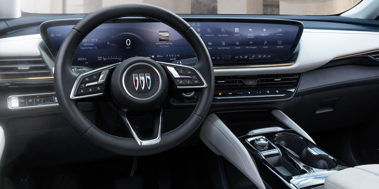 Front Passenger View of the Infotainment System and Steering Wheel in a 2024 Buick Envision Avenir