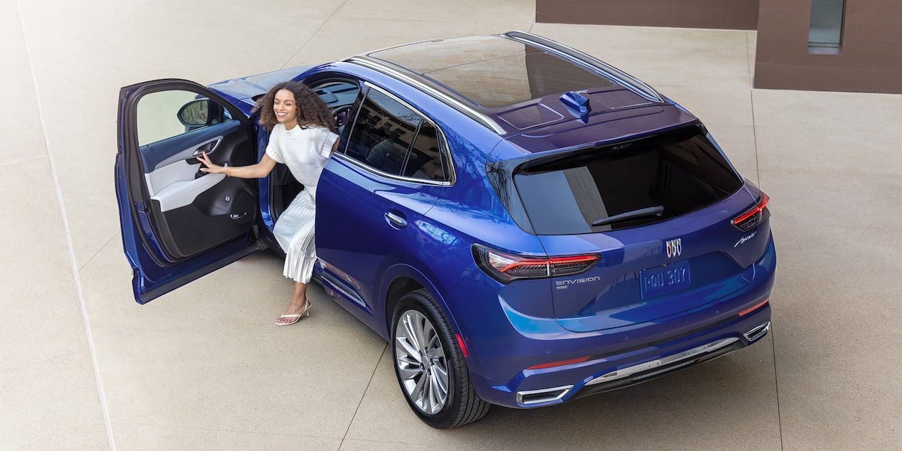 Birdseye View of Person Getting Out of Their 2024 Buick Envision Small SUV