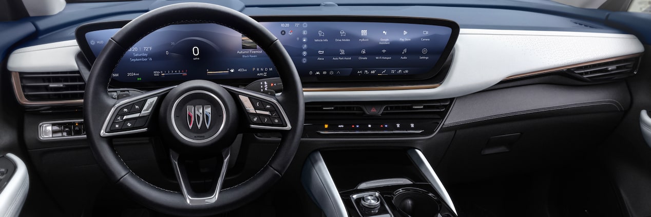 Interior View of the Steering Wheel, Infotainment System, and Seating in a 2024 Buick Envision