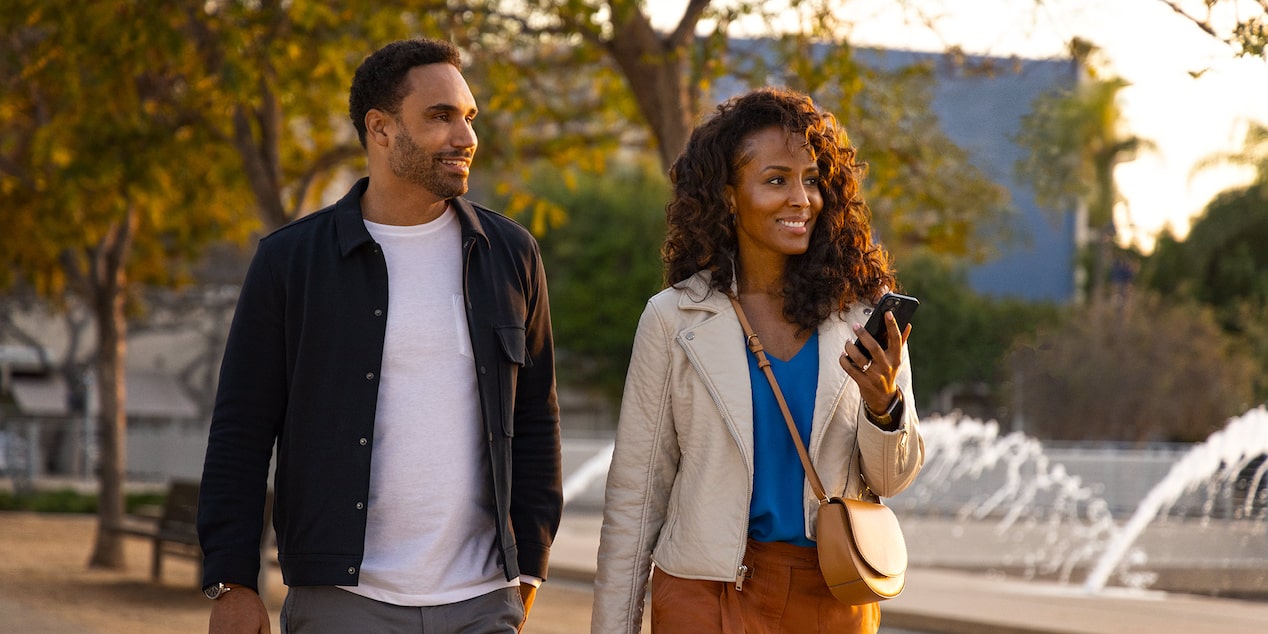 Women Utilizing The MyBuick App Vehicle Locator on her Smart Phone