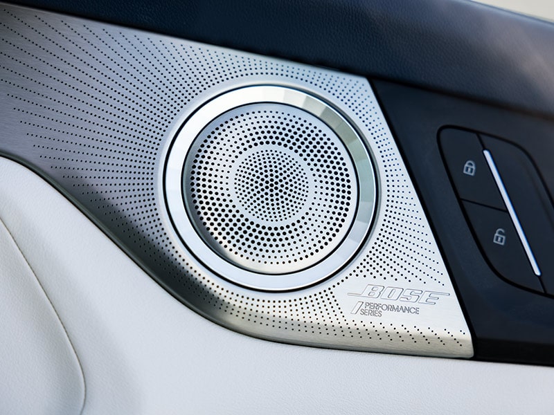 Close-up of a Silver Bose Sound System in a 2025 Buick Enclave