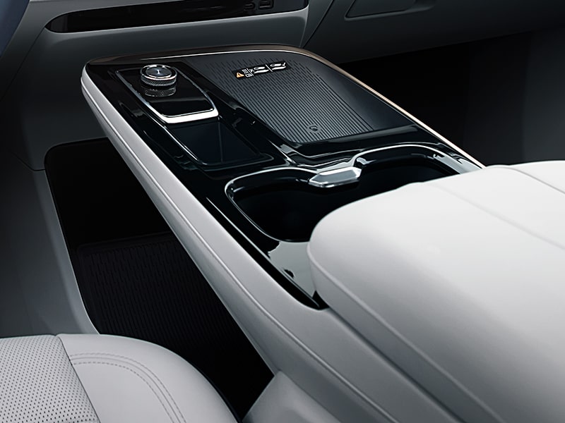 Close-up View of the Gear Shifter and Cup Holders in a 2025 Buick Enclave Mid-Size SUV