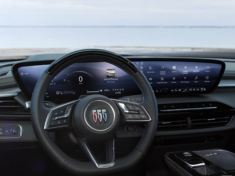 Driver’s Seat View of the Steering Wheel and Infotainment Screen in a  2025 Buick Enclave 3 Row SUV