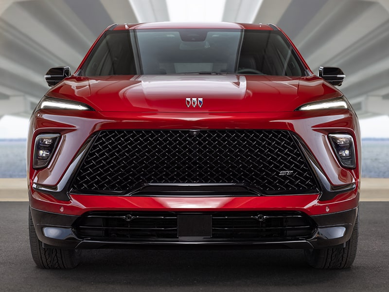 Front View of a 2025 Red Buick Enclave ST Under the Bridge