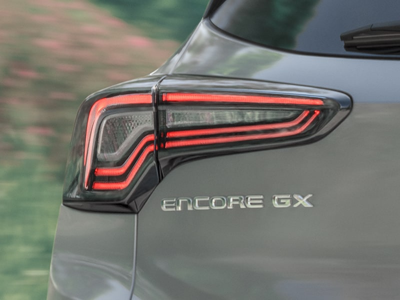 Close-up Exterior View of the 2025 Buick Encore GX Tail Lamp and Model Logo