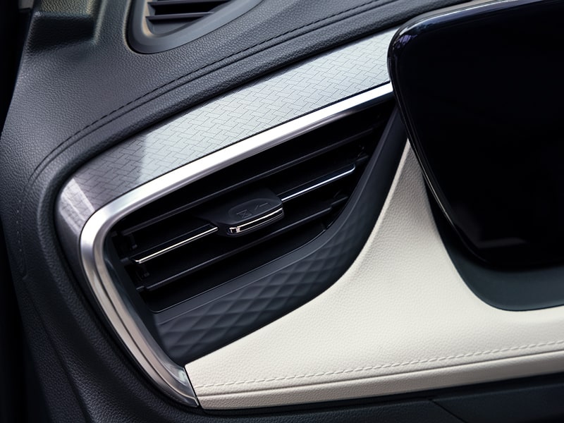 Close-up View of a 2025 Buick Encore GX Avenir Air Vents on Dashboard