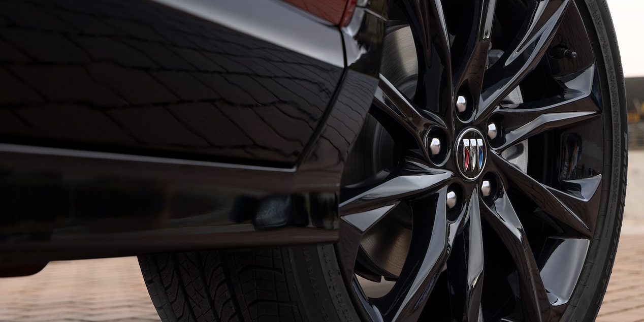 Close-up View of a 2025 Buick Encore GX ST Glossy Wheel and Rim