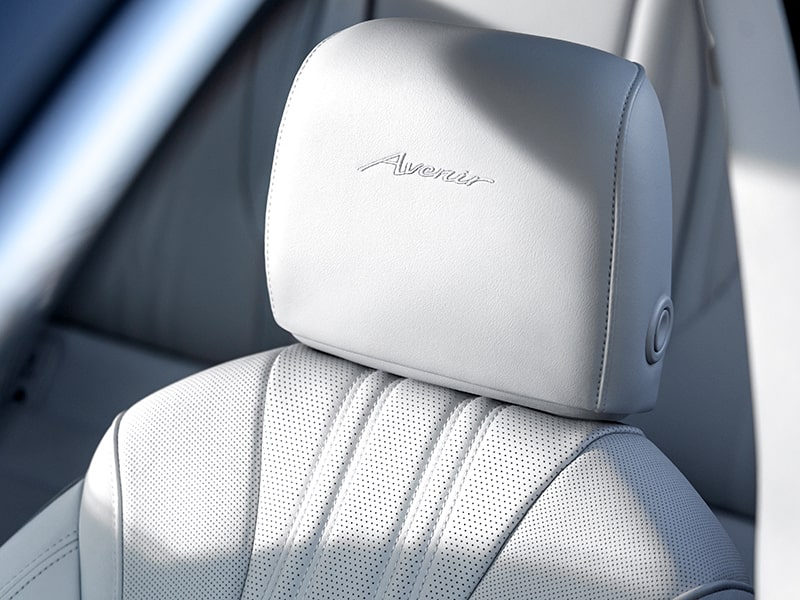 Close-up of the "Avenir" Stitching on the Seat Headrest in a 2025 Buick Envision Avenir Luxury SUV