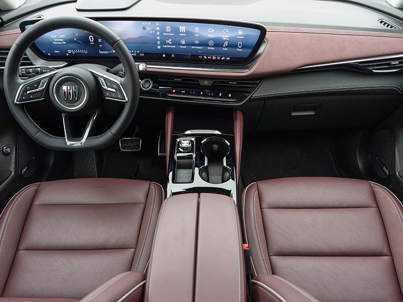 Wide Overhead Interior View of the Steering Wheel and Digital Dashboard in a 2025 Buick Envision ST Sporty SUV