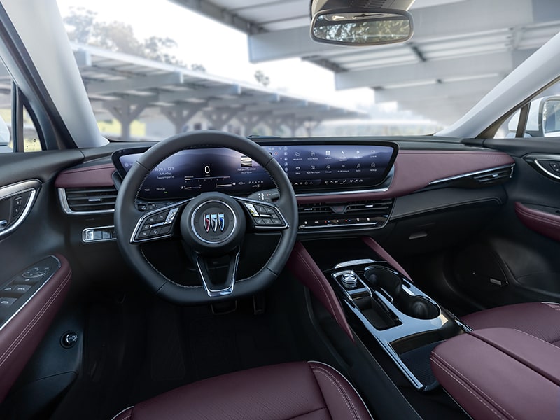 Wide Interior View of the Steering Wheel and Digital Dashboard in a 2025 Buick Envision ST Sporty SUV