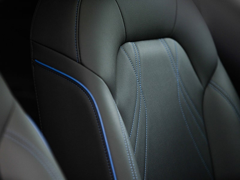 Close-up View of the 2025 Buick Envista Blue Accent Stitching on Leather Seats