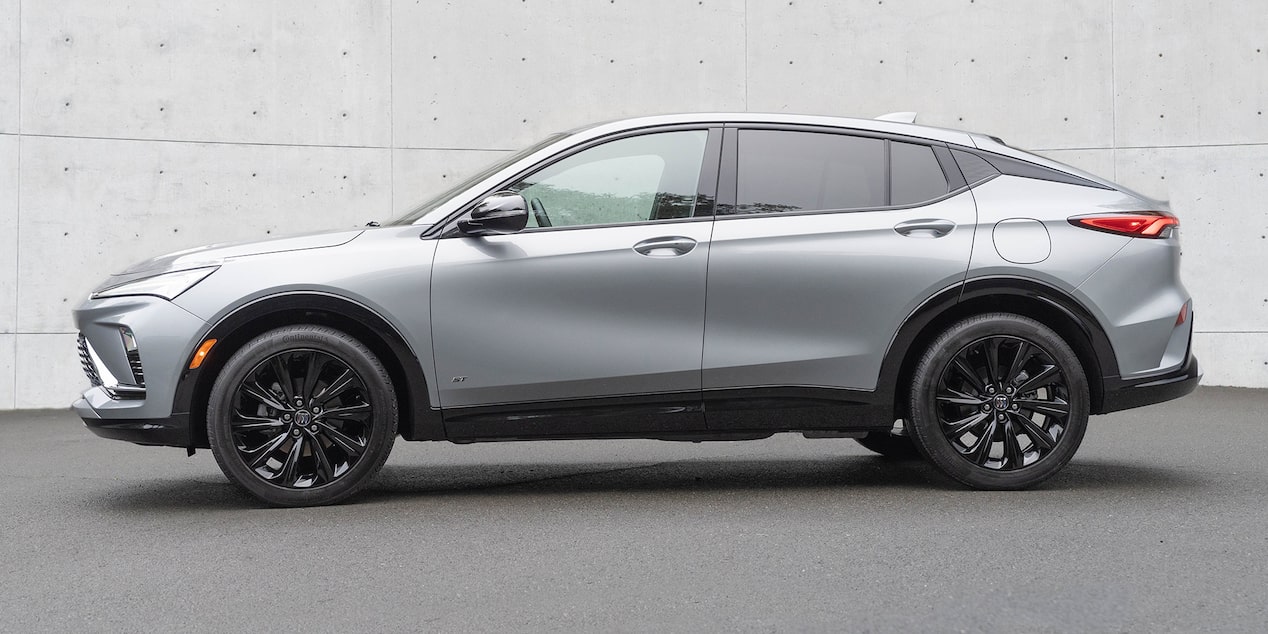 Driver Side View of a Parked 2025 Buick Envista ST Premium Crossover Surrounded by Concrete Walls