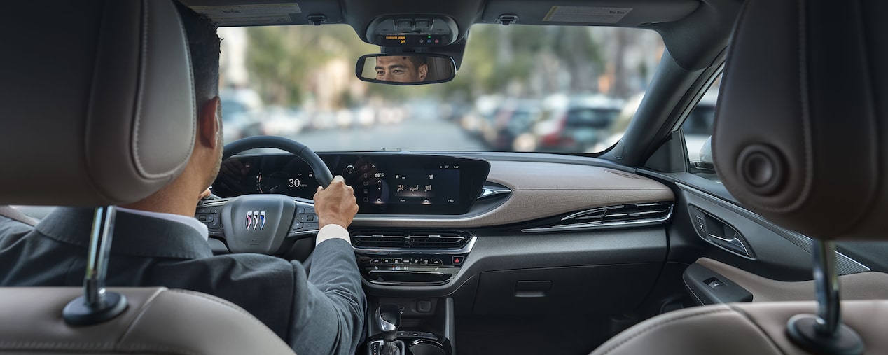 A Man Uses His Buick SUV's Heads-Up Display