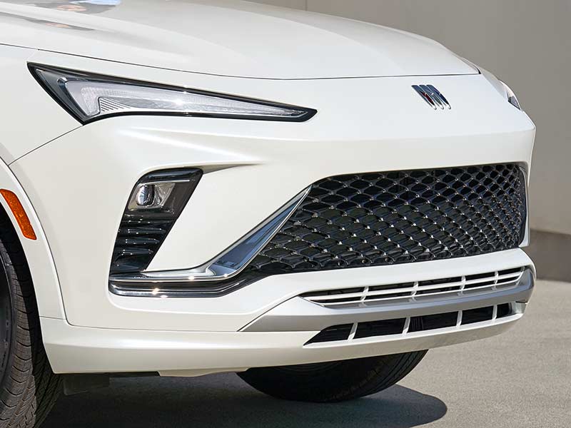 Close Up View of White Buick Grille and Reverse Check Signature Headlamps