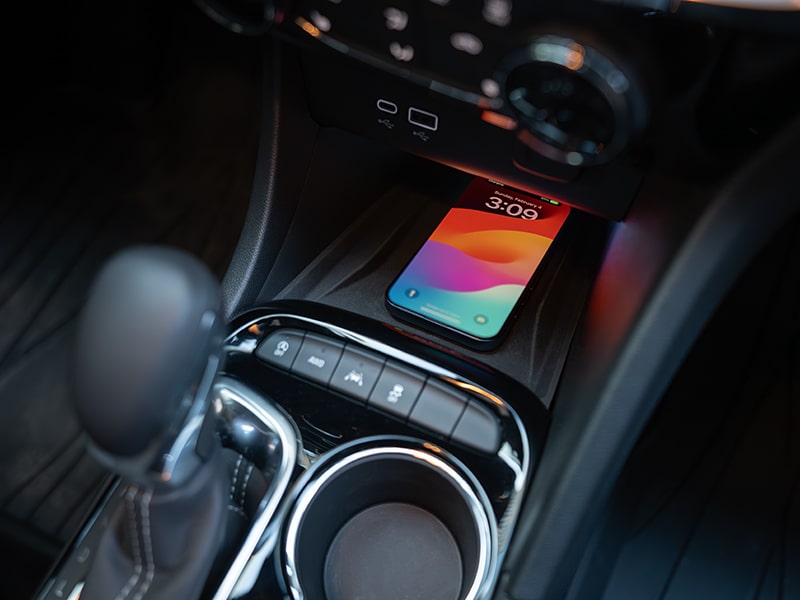 Woman's Reflection Displayed on Buick's Infotainment Touchscreen While Driving