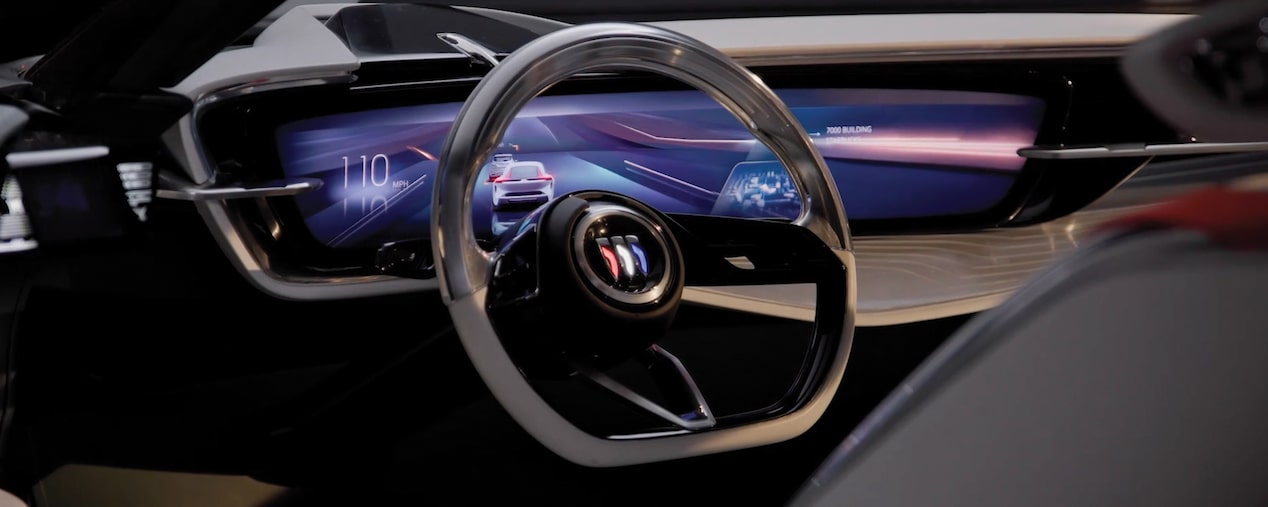 Interior View of a Futuristic Buick Vehicle's Steering Wheel and Digital Dashboard