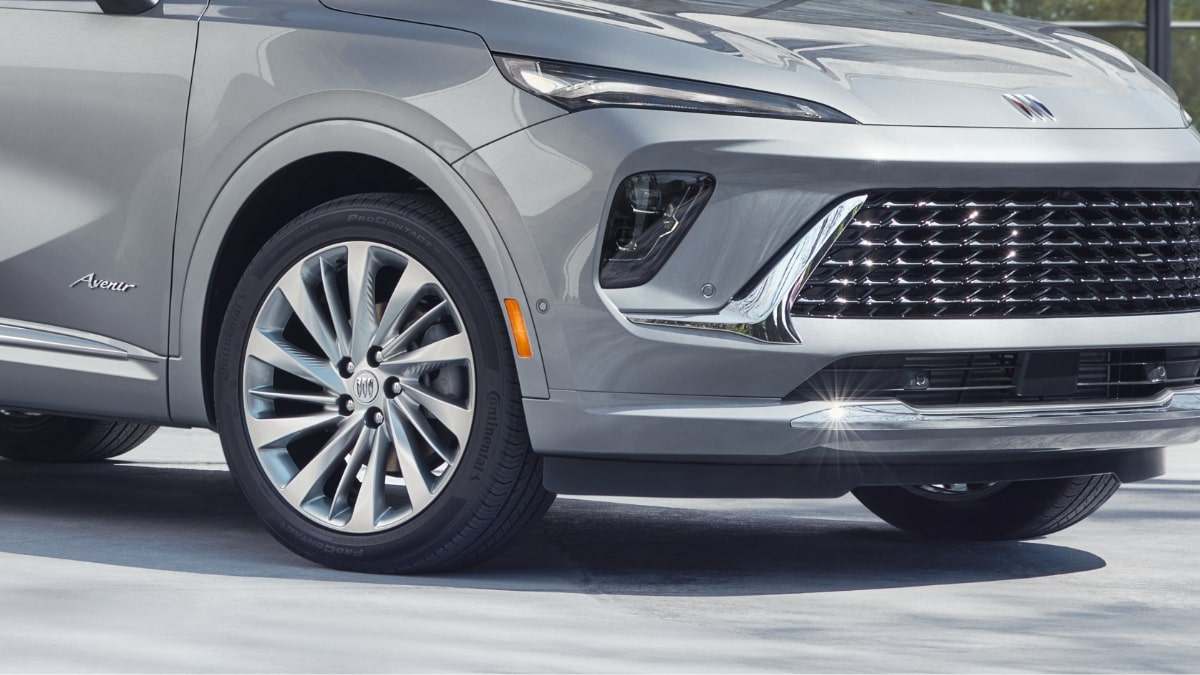 Close-up of Wheels on Buick SUV Driving Through the City