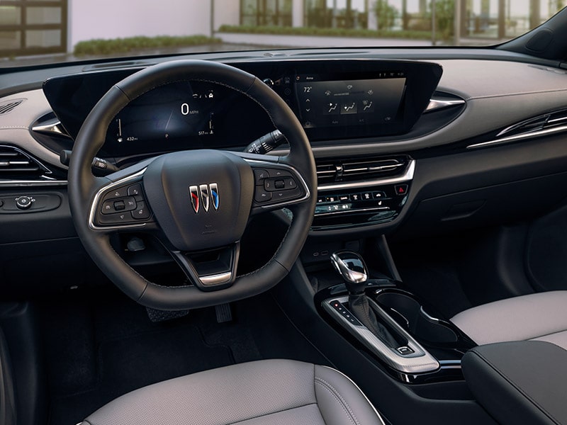 View of the Steering Wheel and Infotainment System From the Driver Seat in the Envista