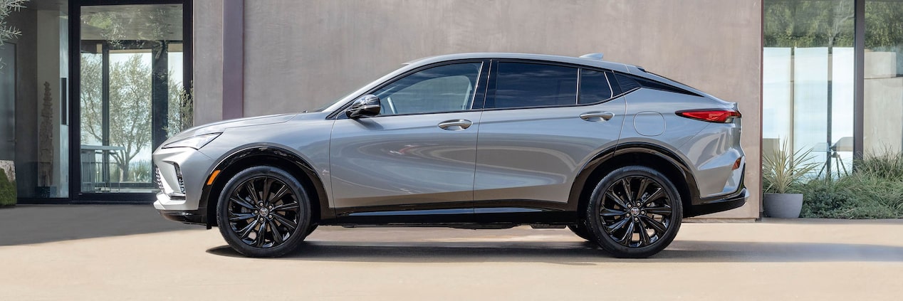 Driver Side View of a 2024 Buick Envista Parked in front of a Building