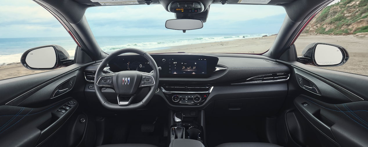 The Rear Seat View of the Buick Envista and a Woman Opening the Rear Side Door