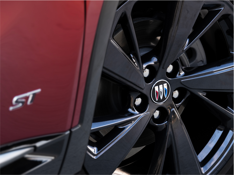 Close-up Shot of a Red Buick Envision Sport Touring's Tire